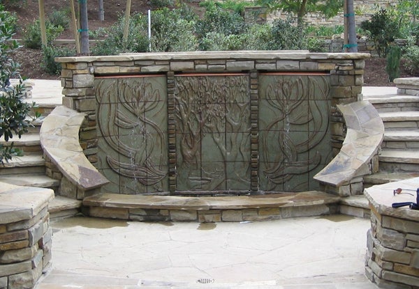 Relief glazed block fountain—ceramic tile and block by Stephenson; stonework by Teresa Clark Design in Rancho Santa Fe, California.  fireplace