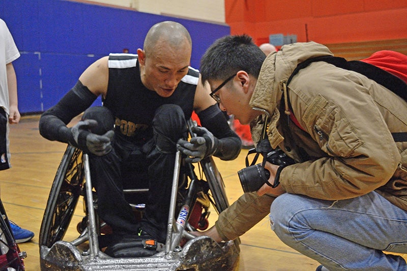 Groulx works with student