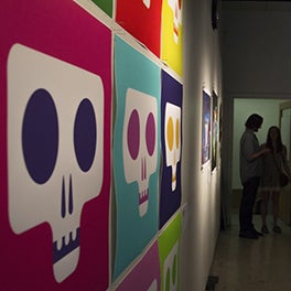 people look at artwork at the 2015 Spring Storm exhibit