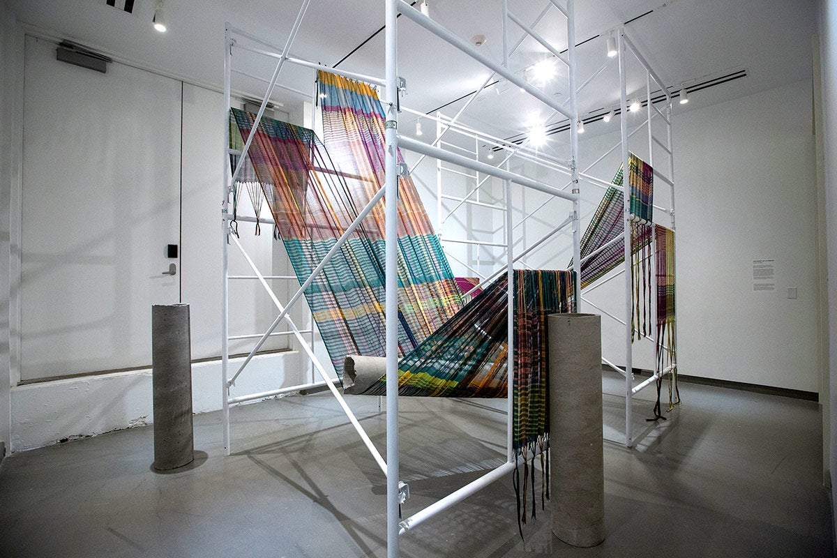 photos of fiber art weaving in gallery