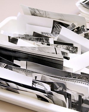 tray of film and black and white photos