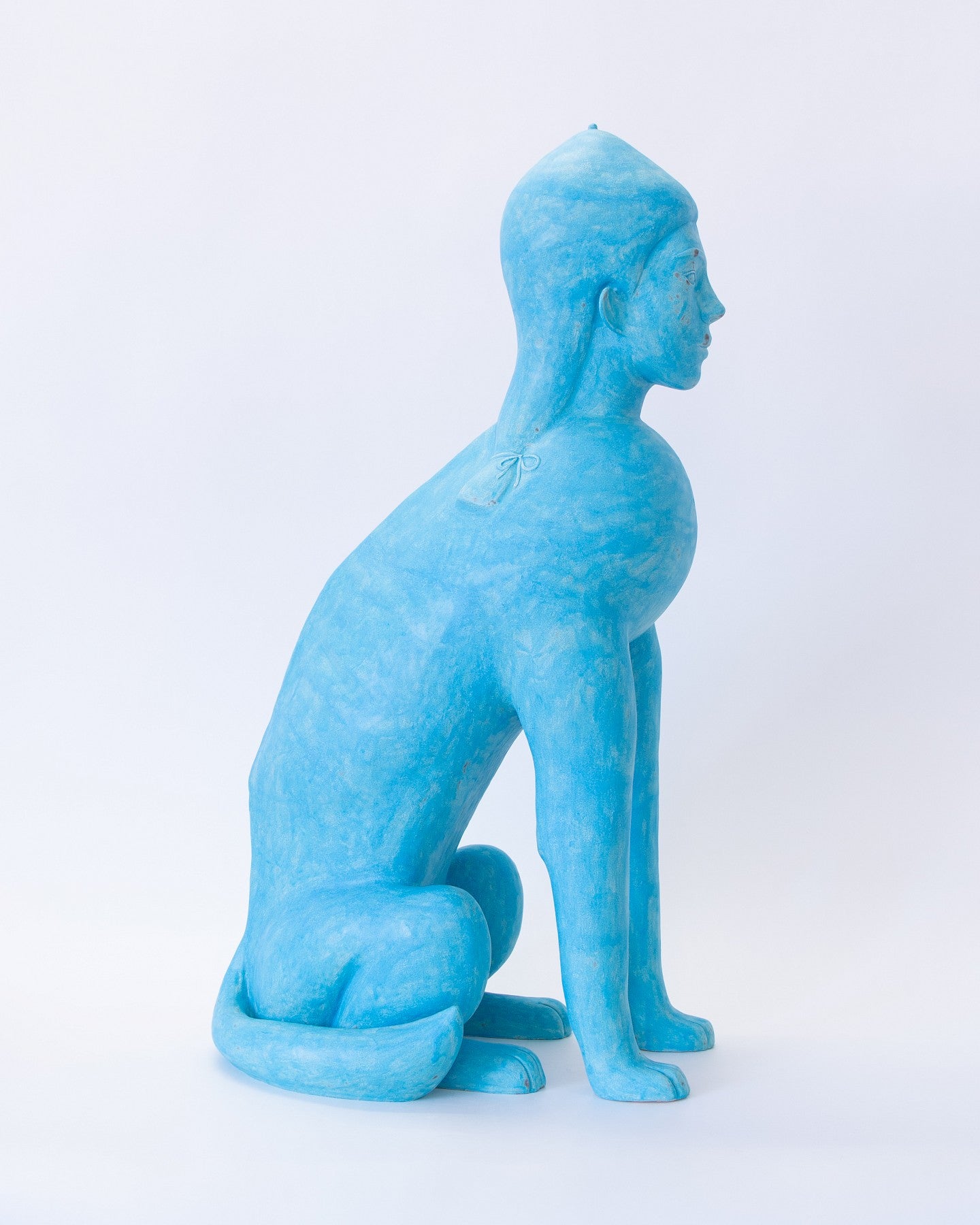 Blue sculpture with the head of Iris and the body of a Wolf