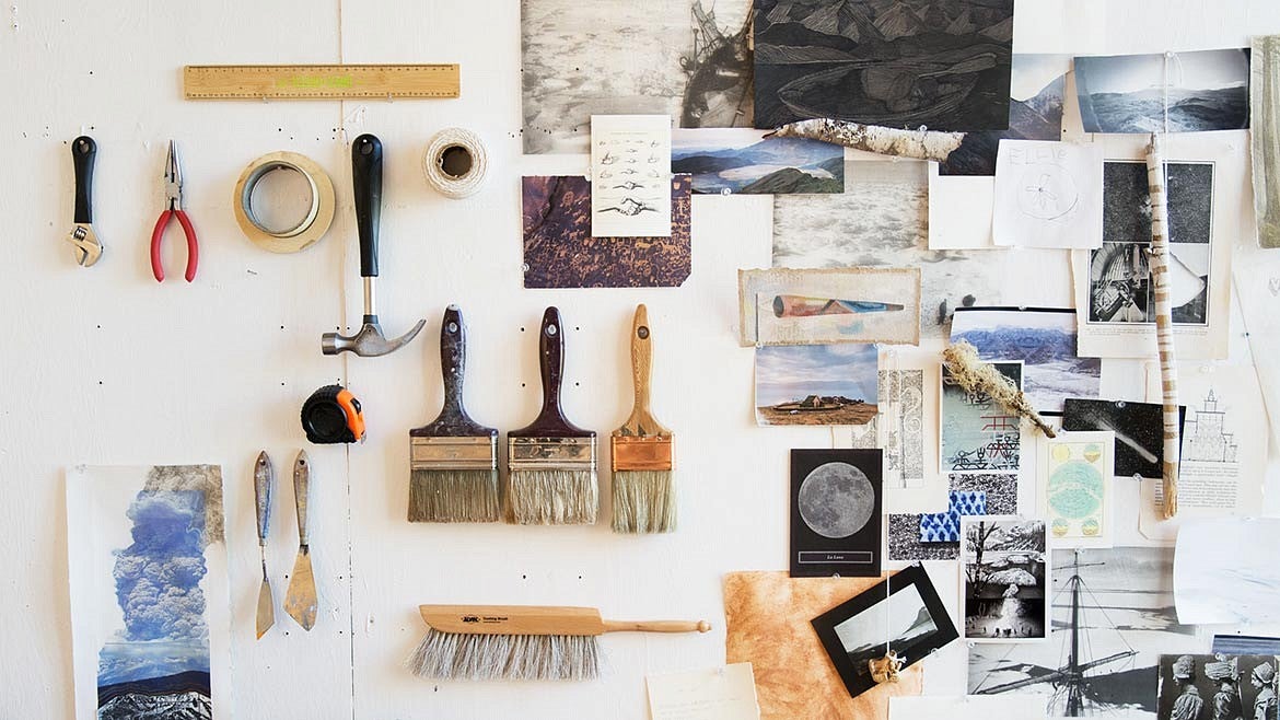tools and artwork hanging on wall