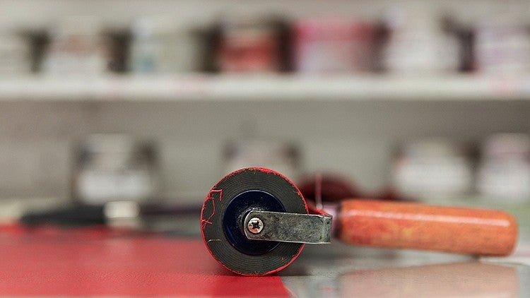 roller with red paint
