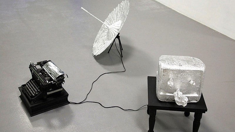 The transcodes, by Fei Chen: tin foil, umbrella, TV monitor, typewriter, wire, wood, paint