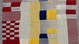 A close-up detail of a weaving by Jovencio de la Paz