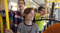 students ride on TriMet light rail