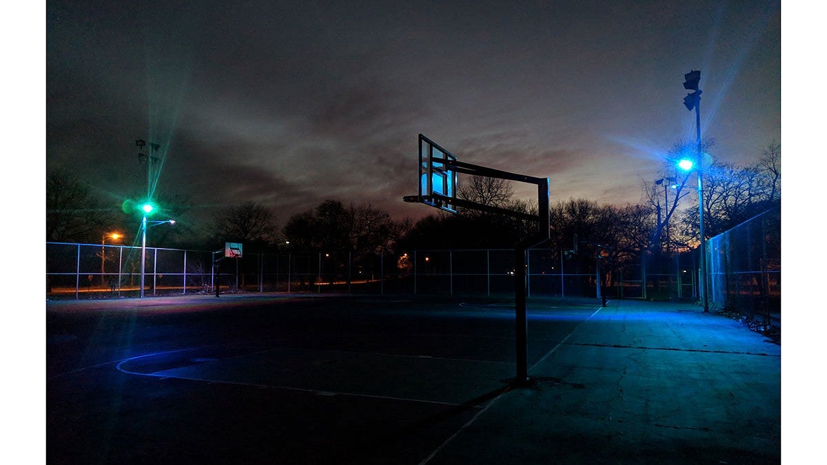 David Rueter: basketball court with lights at night