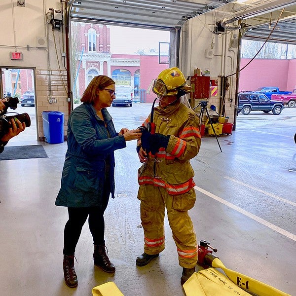 Susan Sokolowski and firefighter
