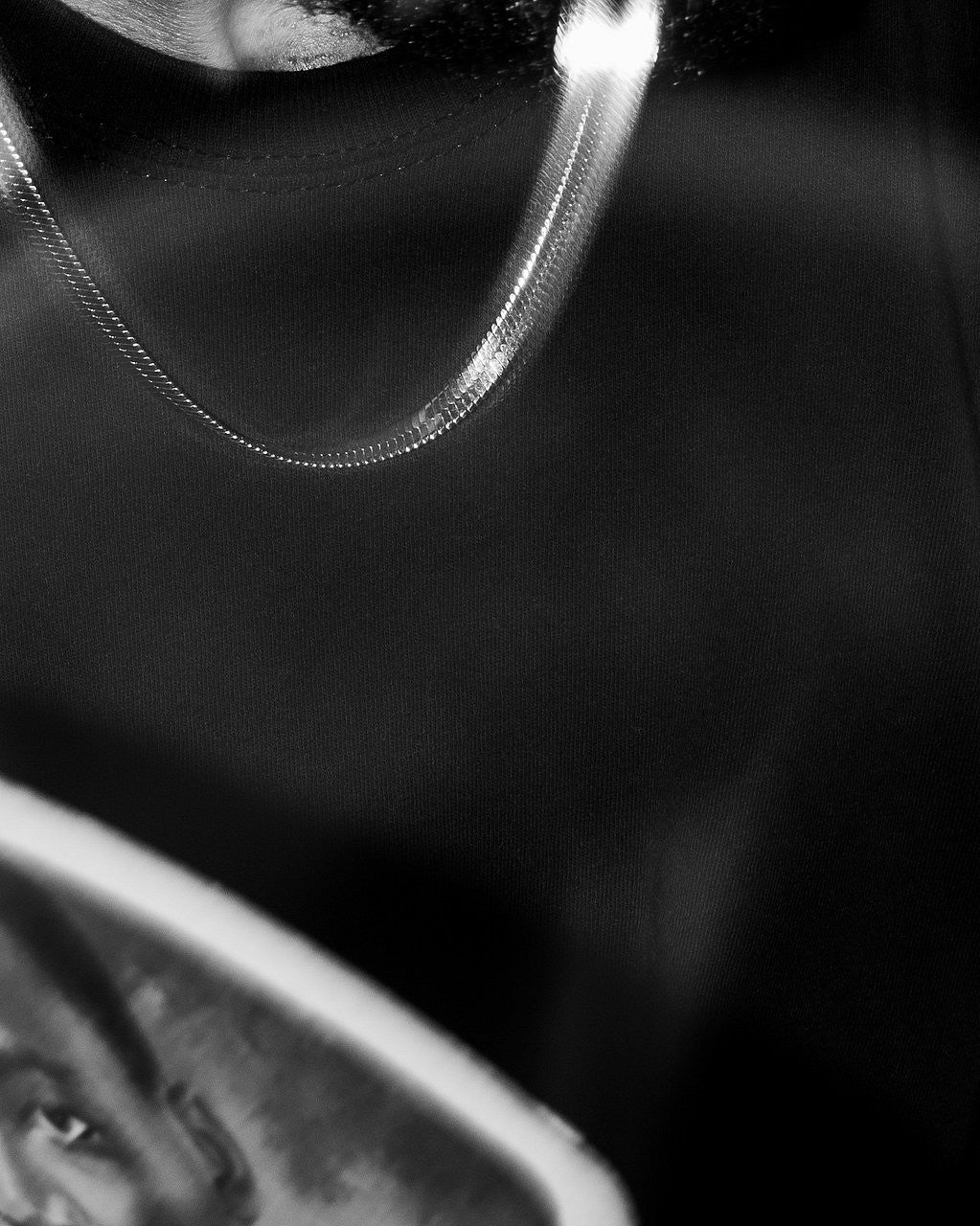 Zora Murff's "War Ready (or, fanning the flames of my desire to burn you down)". A 12x15 inch photograph from 2019 that features close ups of objects in black and white.