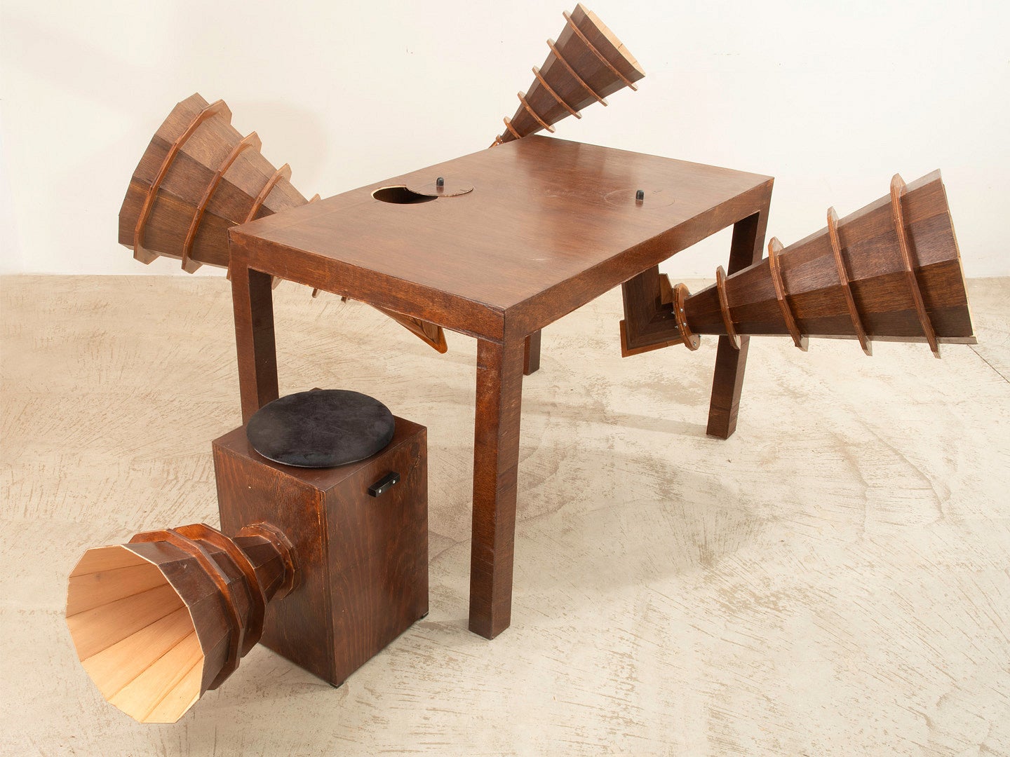 Photograph of an art piece called "Table for A Trio in Four Courses". 