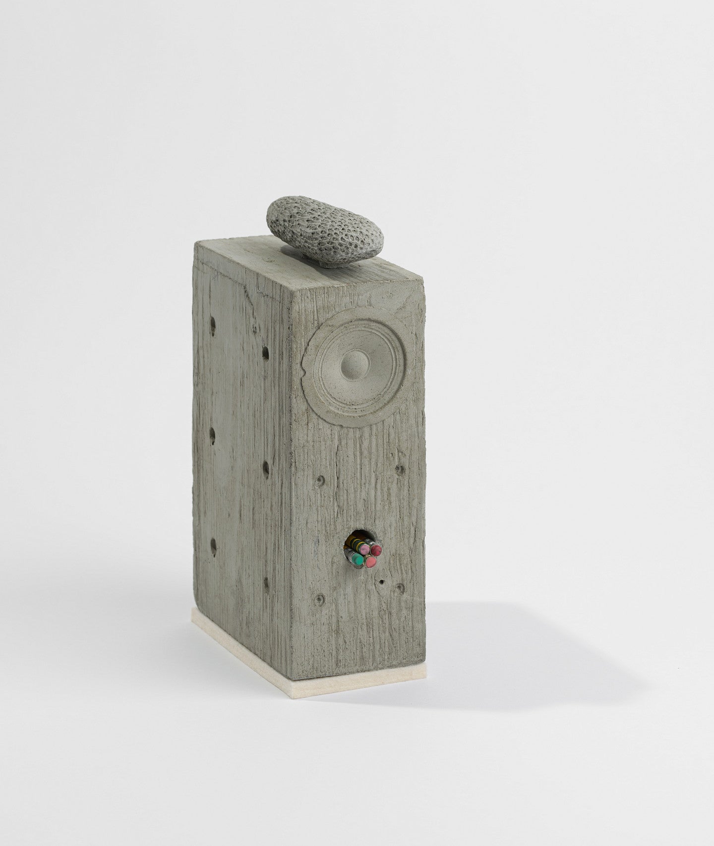 Untitled (Shelf-Speaker)  Cast cement, pencils, felt. Decorative. 