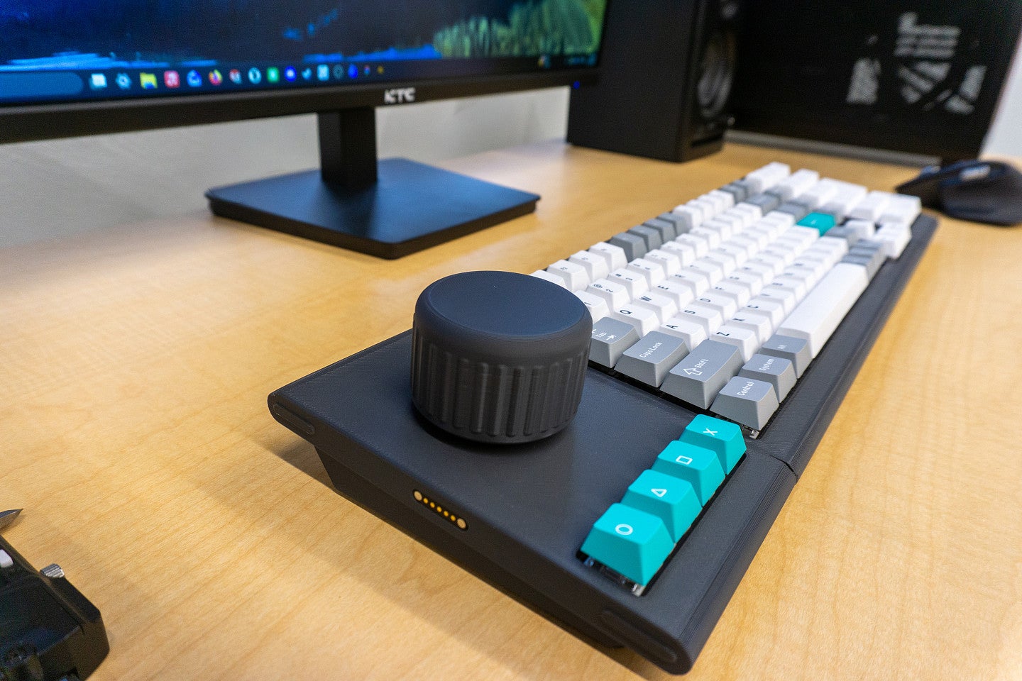 Close-up view of the Command Deck. Shows another combination of the keyboard with a large dial on the left hand side. 