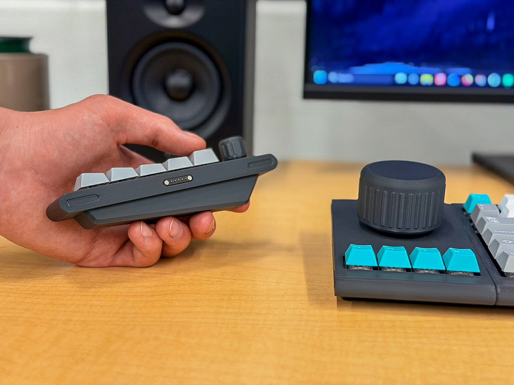 Photograph of two pieces of the Command Deck keyboard. 