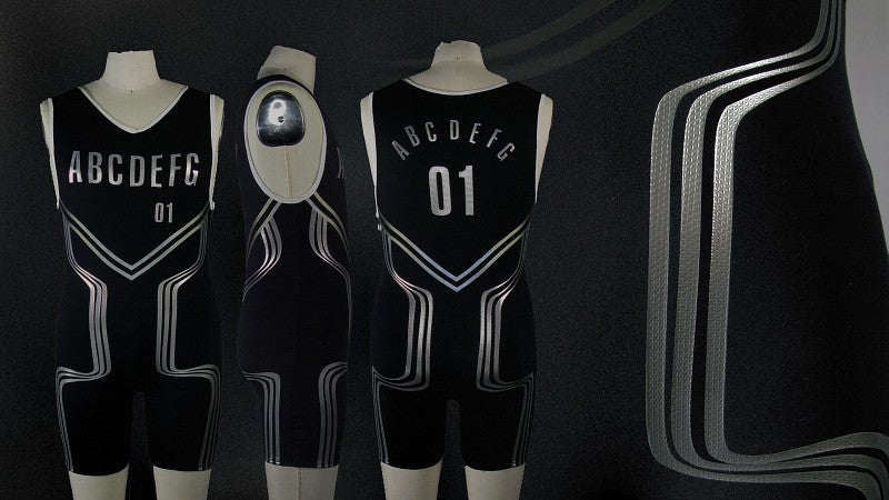 Black unitard with silver accents along side, buttocks, and hips. Includes placeholder names and letters in the same silver material.