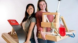 News header for Product Design Story. Shows two students with their catapult prototypes. 