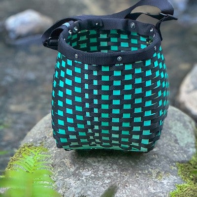 woven green and black basket 